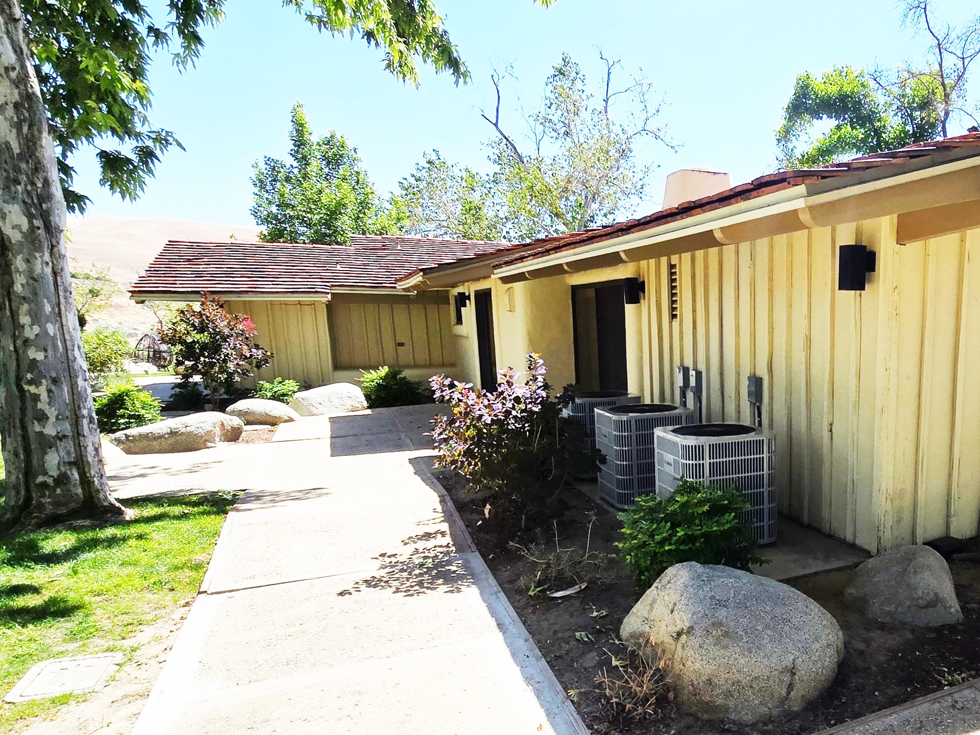 Air conditioning condenser units installed by Budget Air at a Bakersfield home